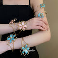 Gold Spiral Arm Cuffs Enamel Flowers Butterflies Five Colors view 3
