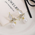 White Butterfly Pearl Look Gold Tone Dangle Stud Earrings view 2