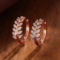 Leaf Motif Hoop Earrings In Three Polished Metal Tones view 3