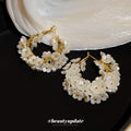 White Floral Pearl Cluster Hoop Earrings in Gold Tone view 4