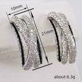 Silver Tone Black and Clear Crystal Crossover Hoop Earrings view 4