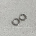 Silver Smooth Round Mini Huggie Hoop Earrings Matching Pair Style view 1