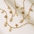 Sacred Heart Multi Charm And Bow Necklace Gold Steel view 1