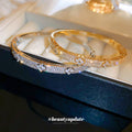 Raised Flower Crystal Hinged Bangle In Gold Tone Or Silver Tone view 2