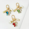 Gold Tone Crystal Charm Keychain With Faux Pearl Pendant view 1