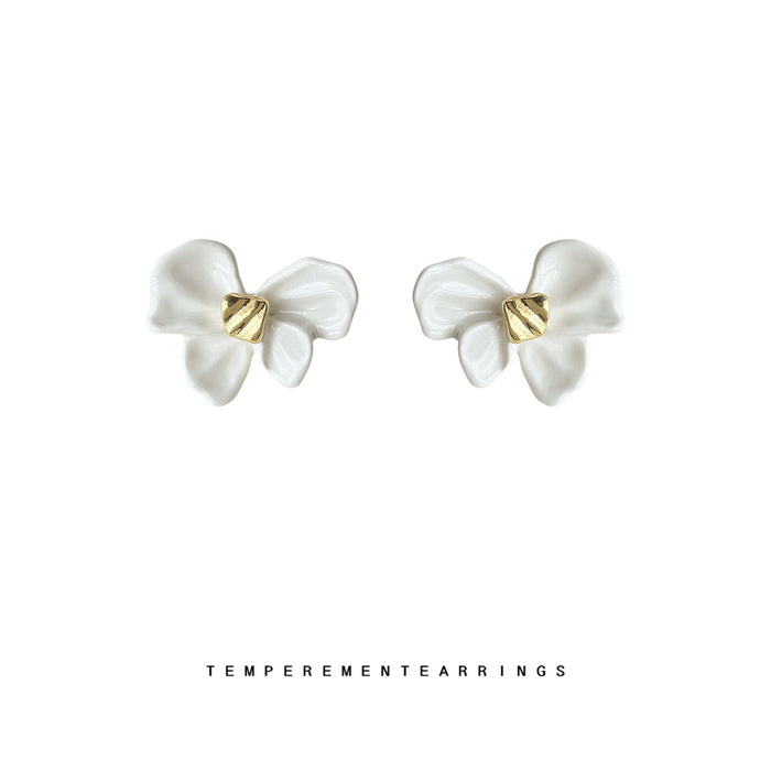 White Enamel Bow Stud Earrings With Gold Center Knot
