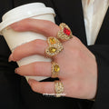 Gold Textured Heart Open Ring Four Piece Red Amber Set view 4