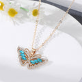 Gold Tone Crystal Butterfly Pendant Necklaces in Blue and White view 2
