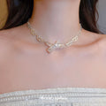 Silver Tone Bow Necklace with Textured Ribbon Links view 3