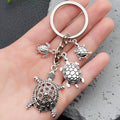 Two Silver Tone Turtle Family Keychain Designs with Metal Hardware view 3