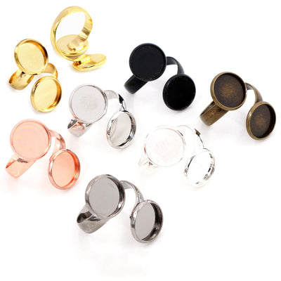 Double Round Bezel Adjustable Ring Blanks in Six Finishes, grouped overview on a plain background