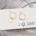 Mismatched Star and Crescent Moon Huggie Hoop Earrings view 2
