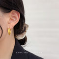 Round Huggie Hoop Earrings In Gold Silver Polished And Matte view 2