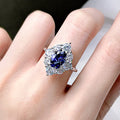 Deep Blue Oval Floral Cluster Statement Ring In Silver Tone view 2