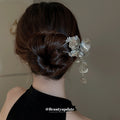 Gold Tone Flower Hair Pin With Textured Petals And Hanging Leaves view 3
