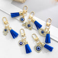Gold-Tone Rhinestone Evil Eye Keychain with Blue Suede Tassel view 2