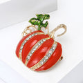 Orange Enamel Pumpkin Brooch With Polished Metal And Sculpted Decorative Details view 2