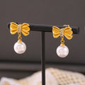 Bow Pearl Drop Stud Earrings with Rhinestone Center Gold Steel view 4