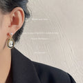 Gold Tone Pearl Top Black White Cameo Profile Medallion Drop Earrings view 2