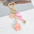 Pink Heart Clasp Keychain with Iridescent Hearts and Glitter Flower Charm view 8