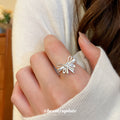Silver Open Bow Ring With Heart Clear Crystal Center view 1