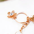 Large Jeweled Daisy Keychain with Layered Petals and Gold Tone Hardware view 4