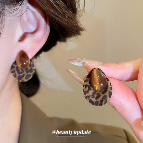 brown leopard print teardrop stud earrings with cabochons shown in the main product view