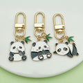 Panda Charm Keychains Featuring White Apple Across 54 Pictured Variations view 2