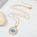 Gold Tone Blue Evil Eye and Hamsa Hand Pendant Necklaces view 2