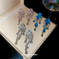 Crystal Teardrop Chandelier Stud Earrings with Polished Metal Details view 3