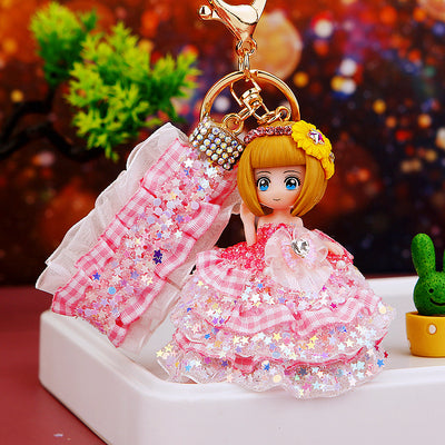Main image 1 shows a supplied presentation of crystal star plaid dress doll keychains with visible attached key hardware