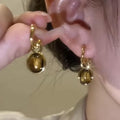 Gold Tone Oval Brown Stone Hoop Earrings Jewelry Design view 6