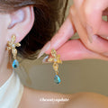 Floral Crystal Teardrop Earrings in Polished Statement Design view 3