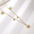 Gold Tone Star and Butterfly Station Necklace with Clear Stones view 1