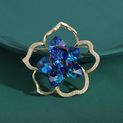 Front view of layered camellia flower in blue