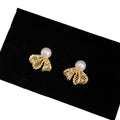 Bow Stud Earrings with Clear Crystals and Pearl Like Tops view 5