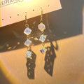 Three Clear Iridescent Cube Gold Tone Dangle Earrings view 3