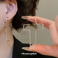 Large Open Cross Drop Earrings in Gold and Silver Tones view 3