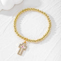 Gold Tone Beaded Crystal Evil Eye Flower Star and Cross Bracelets view 10