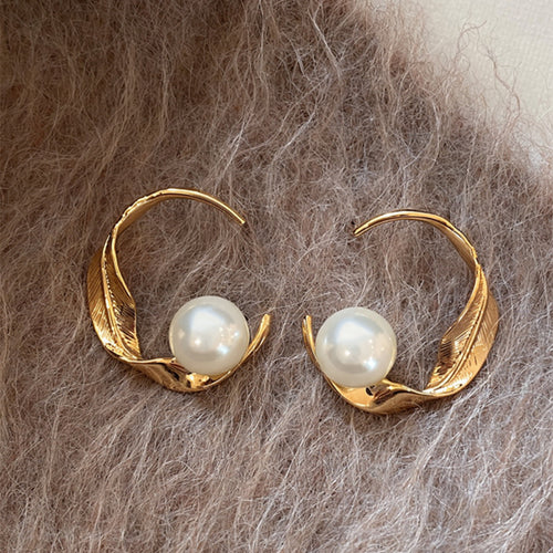 Gold Tone Curved Leaf Hoop Earrings with Pearls shown as a complete design