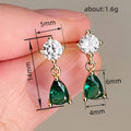 Gold Tone Green Teardrop Earrings With Clear Round Tops view 4