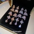 Crystal Leaf Cascade Drop Earrings In Gold And Silver Tones view 4