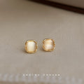 Square Cream Cat Eye Glass Stud Earrings Gold Frame view 4