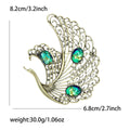 Openwork Swan Brooch In Metal With Filigree Wings And Three Iridescent Cabochons view 6