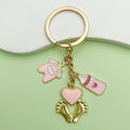 Baby Shower Charm Keychains Featuring Pink Bottle Clasp Across 14 Pictured Variations view 4