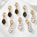 Gold Tone Pressed Flower Hamsa Lobster-Clasp Charms in Nine Options view 1