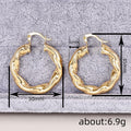 Irregular Wavy Hoop Earrings in Gold-Tone Metal Jewelry view 4