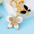 Mixed Cloud Pattern and Pearl Butterfly Pair Keychains in Four Designs view 7