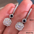 Black Round Stone and Square Halo Long Drop Earrings in Silver Tone view 4