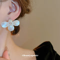 White Petal Flower Stud Earrings with Pearly Centers view 3